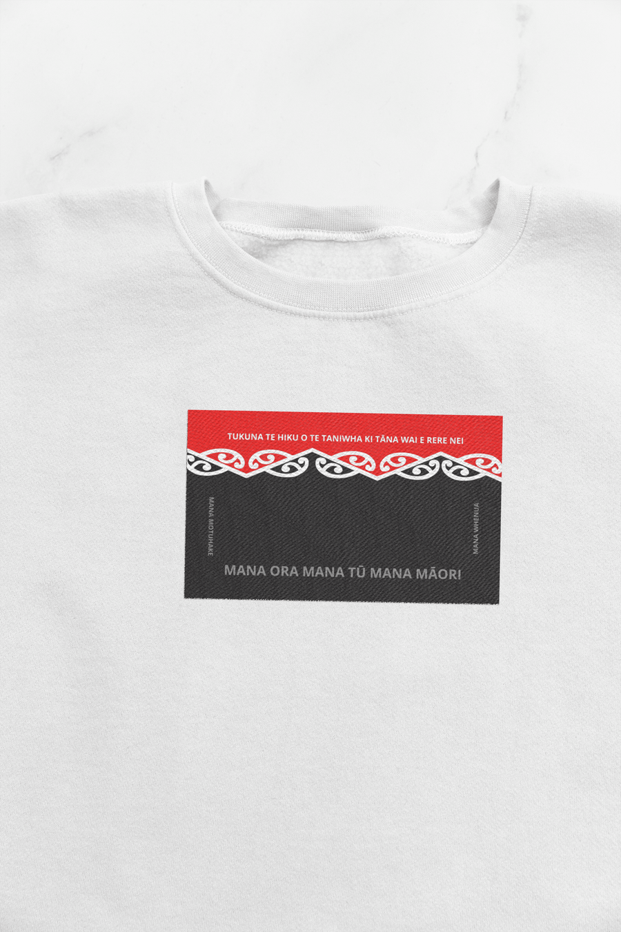 Ko te moko kākahu (official embroidered iron on taniwha logo for clothing) Whiti 