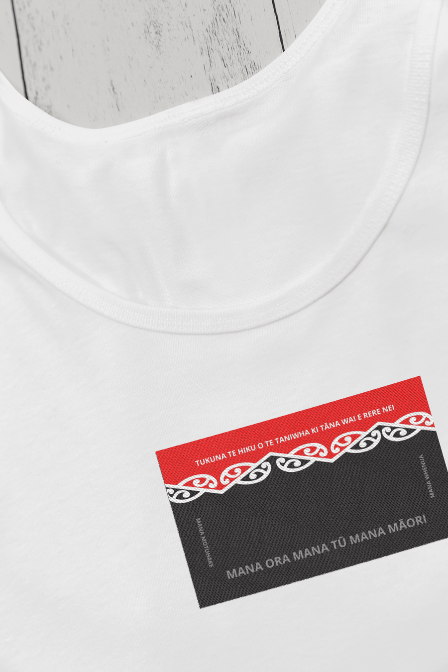 Ko te moko kākahu (official embroidered iron on taniwha logo for clothing) Whiti 